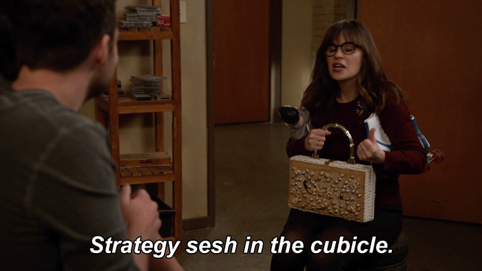 New girl jessica talking about strategy sesh in the cubicle.gif