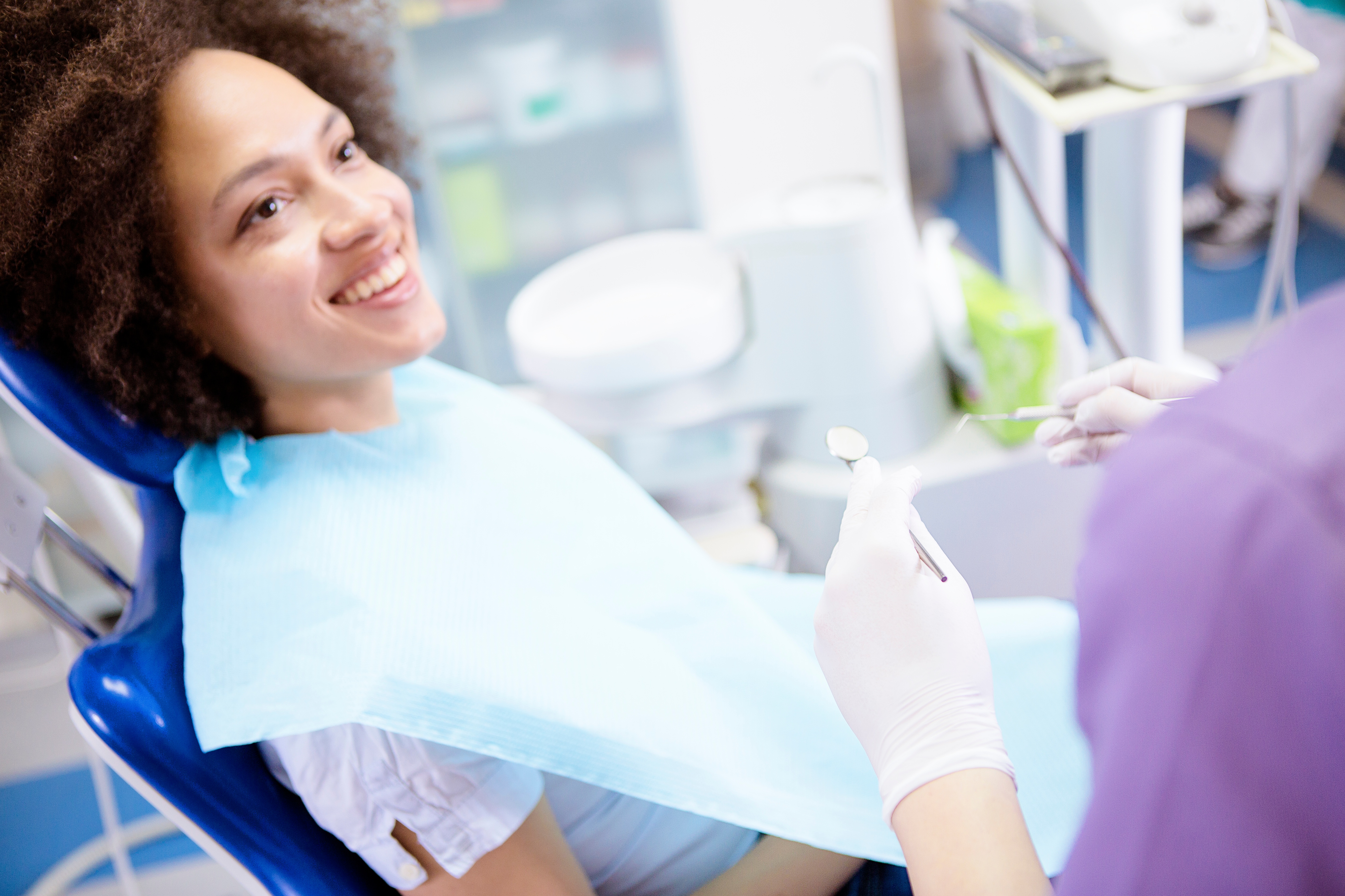 woman smiling at dentist appointment