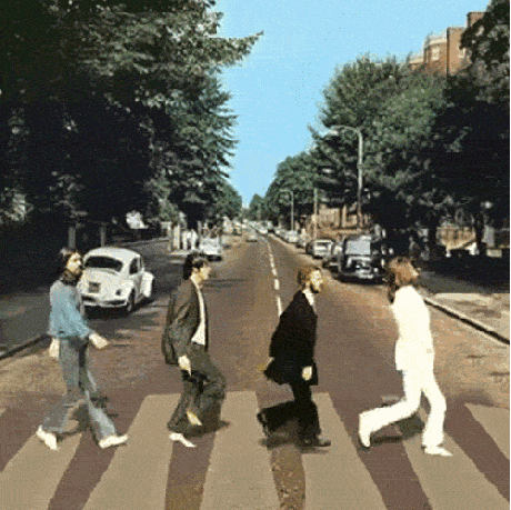four-men-struting-across-the-street four-men-struting-across-the-street
