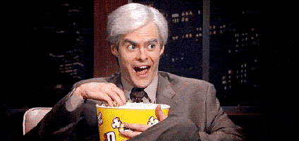 gray-haired-man-eating-popcorn