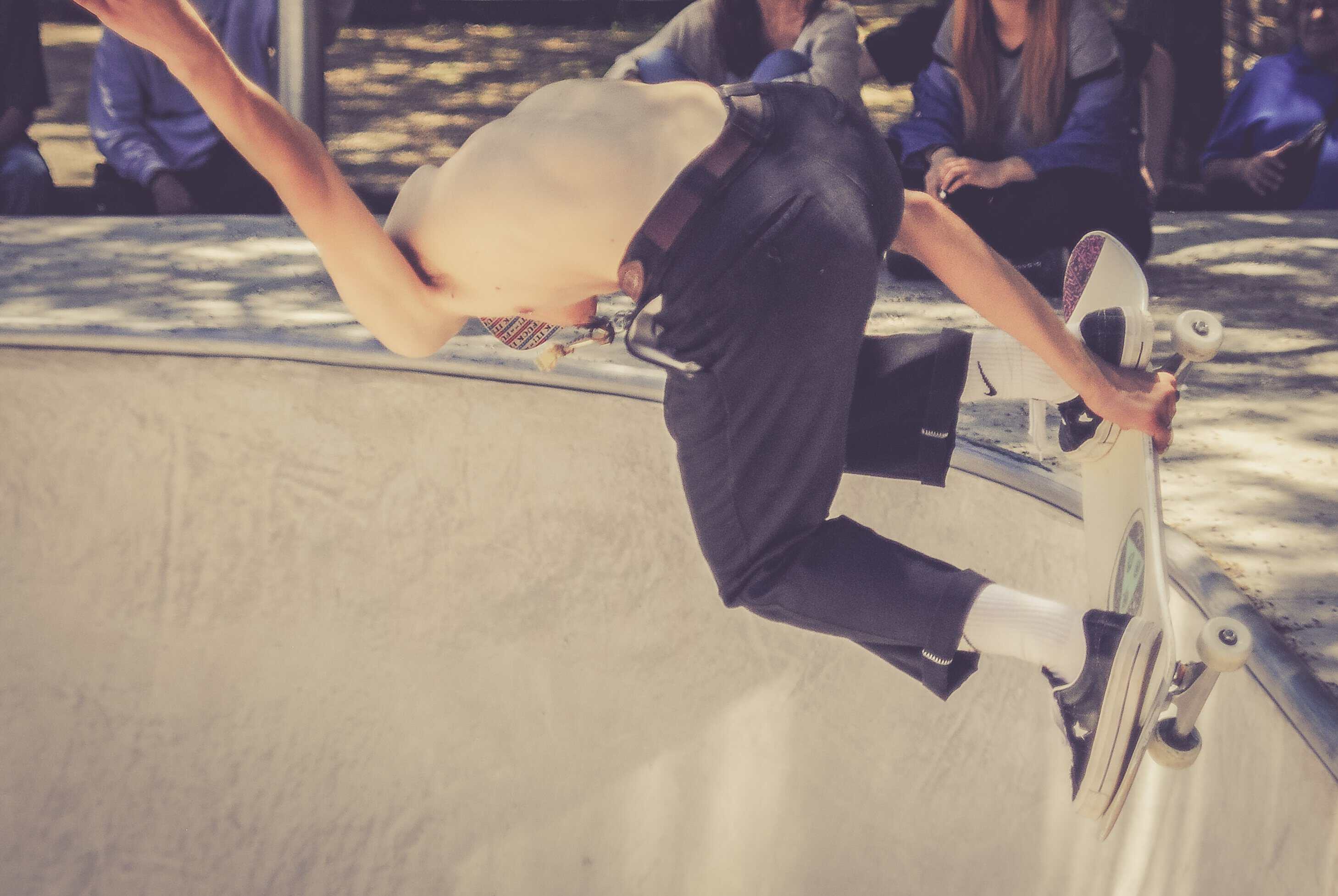 skateboarder-doing-tricks-in-skate-park