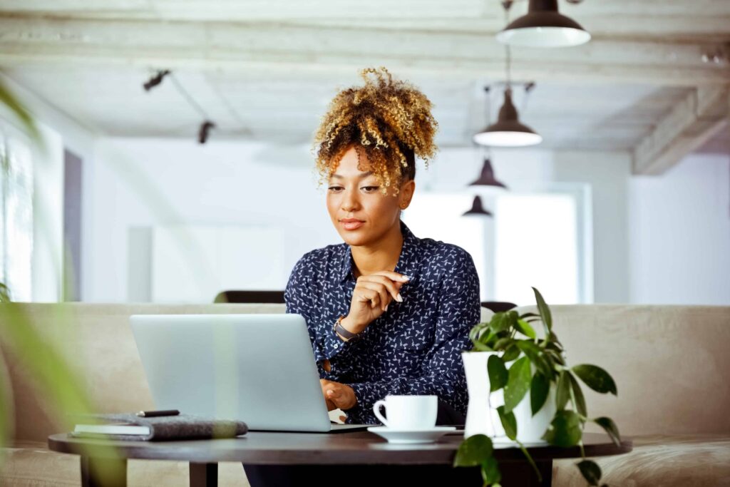 woman on computer in cafe